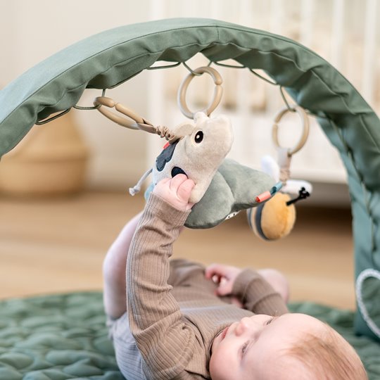 Done by Deer Pałąk z Zabawkami - Stojak Edukacyjny